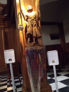 Statue of St. Andrew with a 'prayer net'